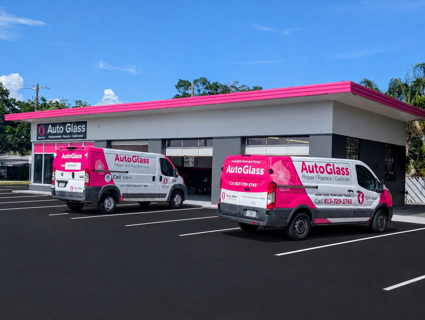 Optic-Kleer Autoglass of Tampa shop with branded service vans