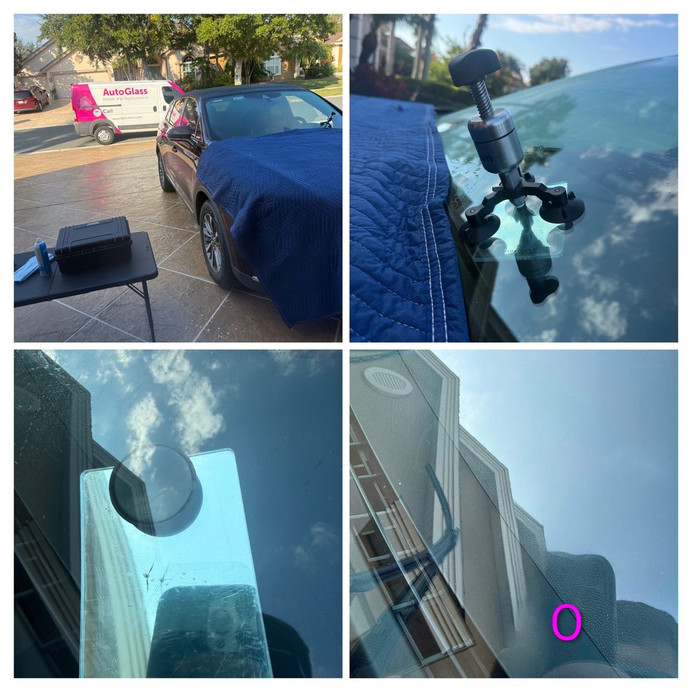 Rock chip repair kit set up on a vehicle windshield